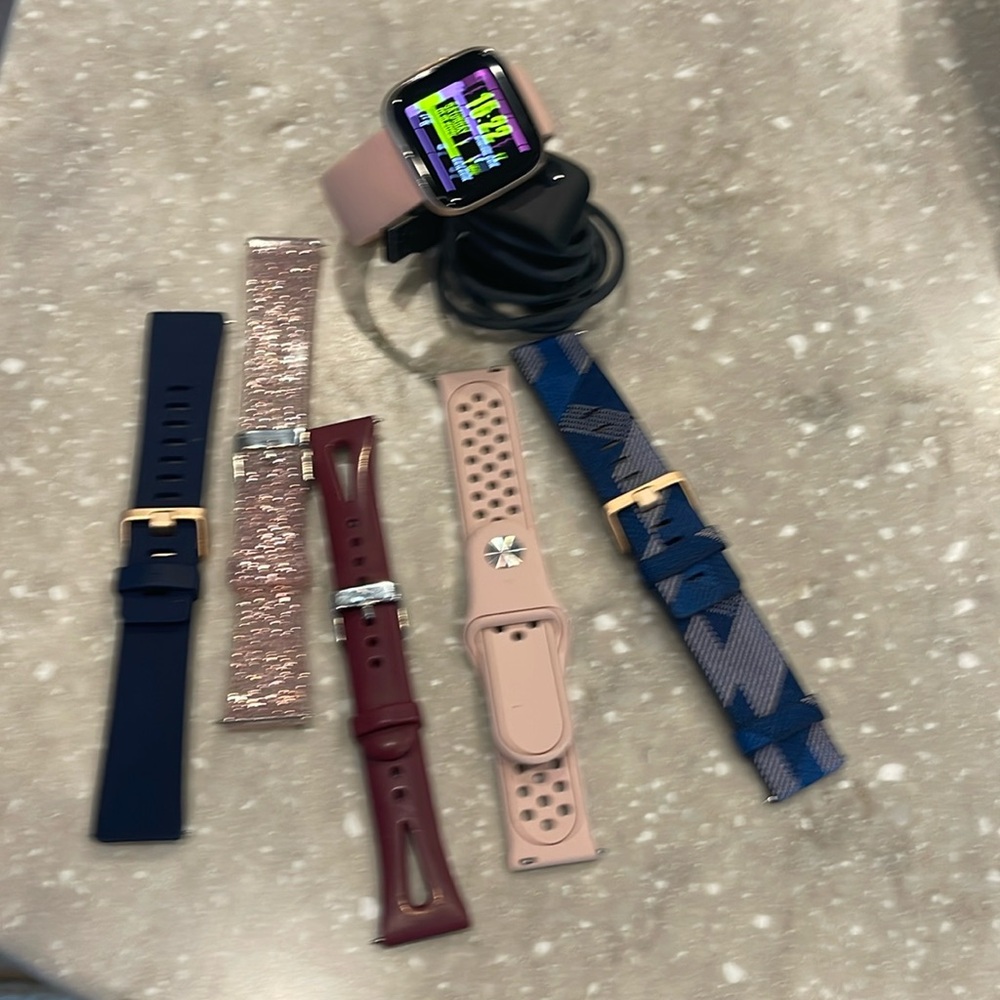 Fitbit Versa 2 with many bands